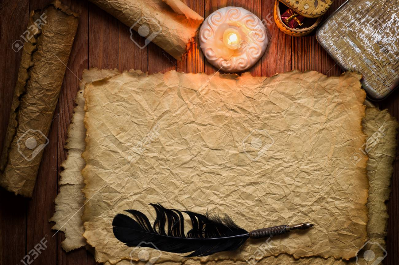 Ancient Papyrus Paper With Feather And Candle On Wood Table with regard to Feather And Papyrus Template